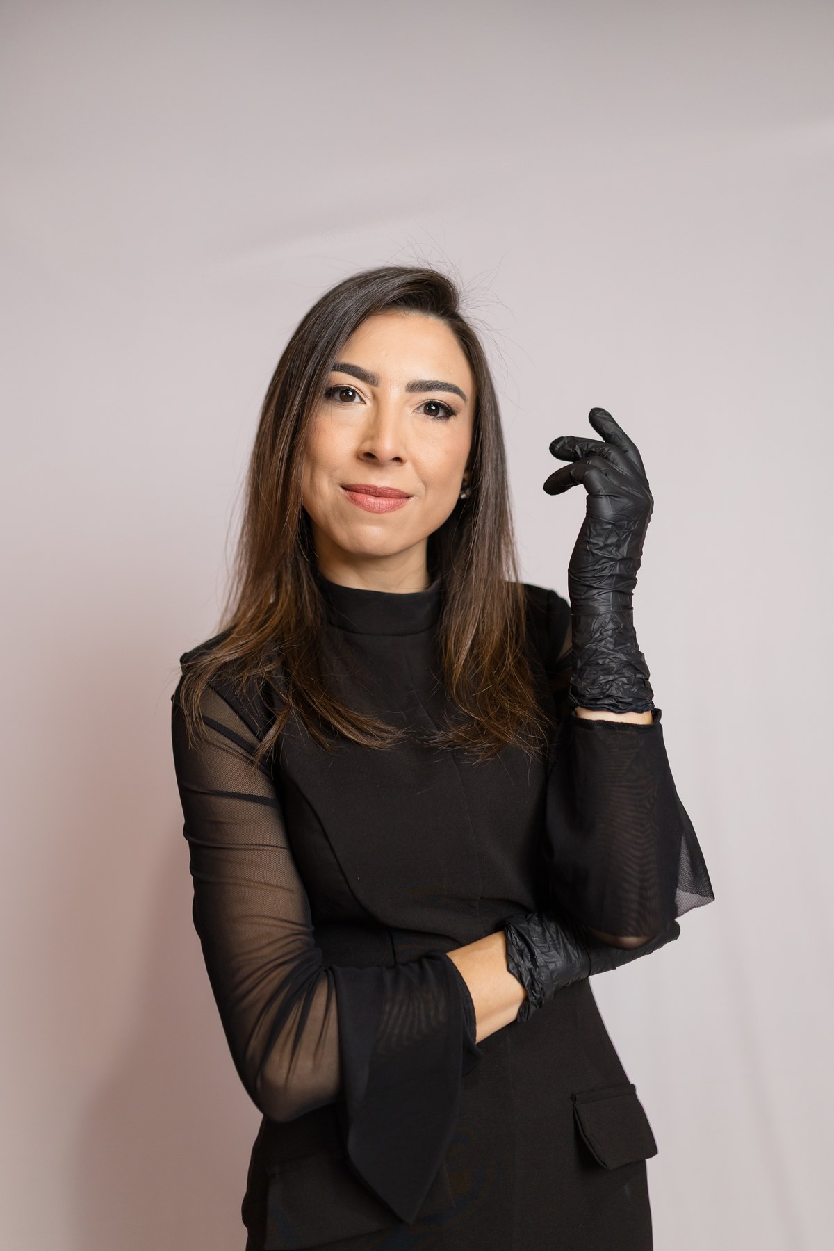Marcia Bairros, founder of Bella Brazil, in her professional beauty uniform