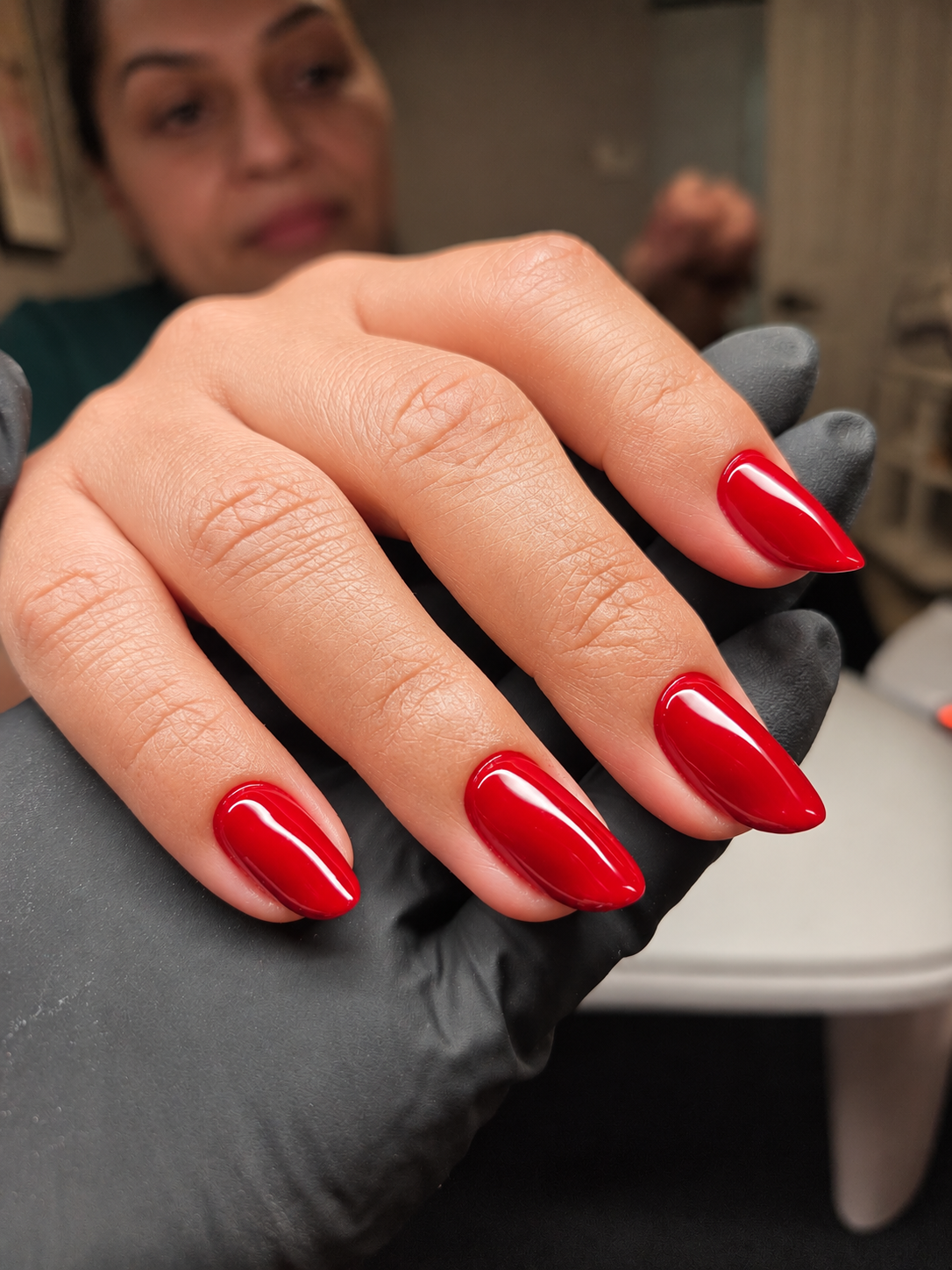 Bella Brazil red almond manicure shared on Instagram