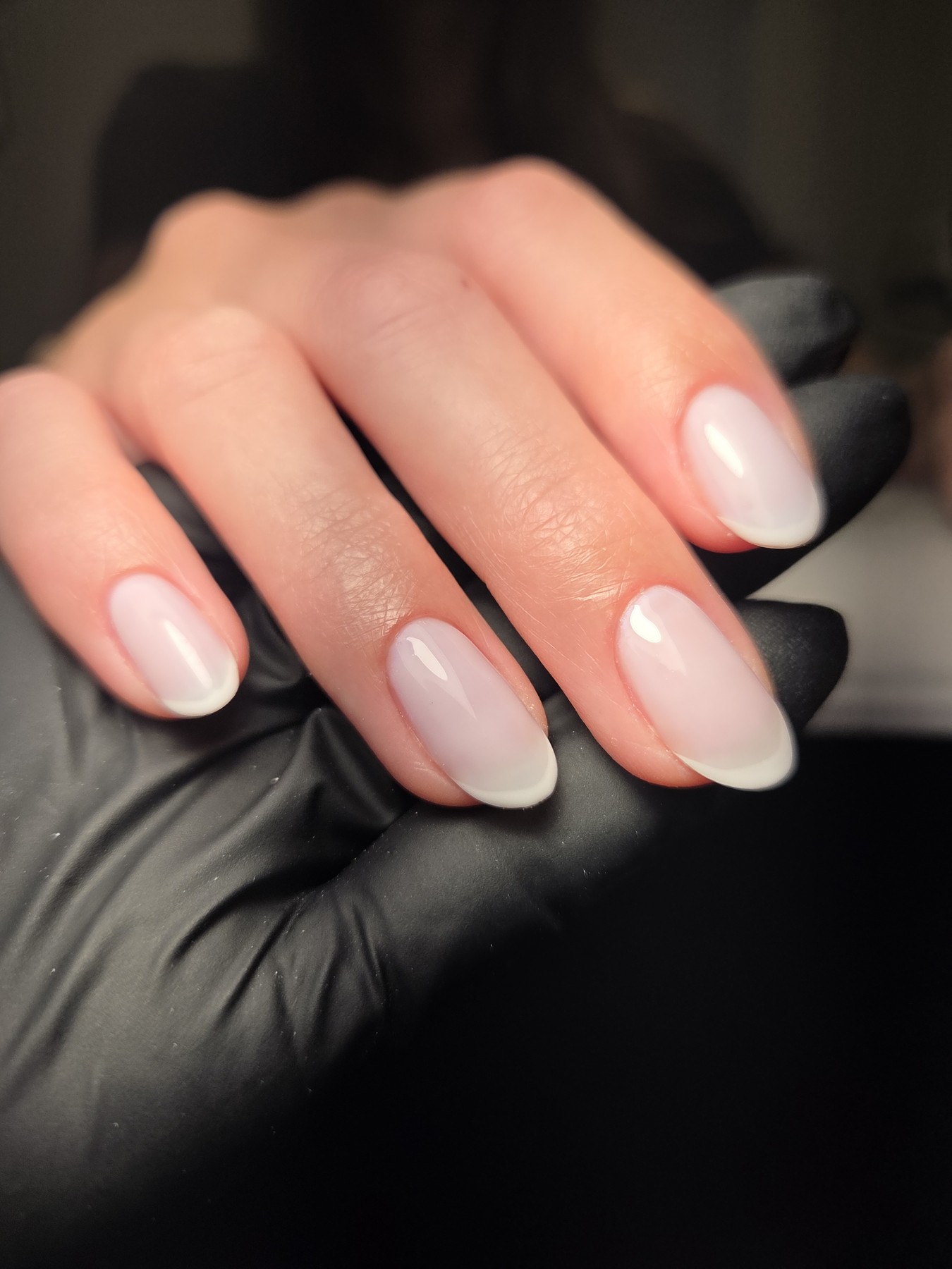 Soft French manicure with a precise cuticle line by Bella Brazil