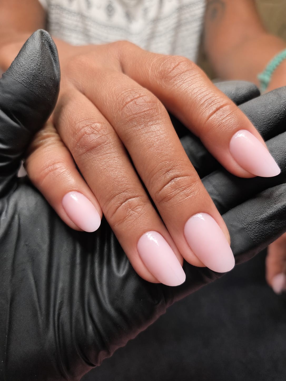 Soft pink almond manicure with balanced shaping by Bella Brazil